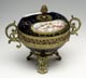 Putti-Dose.