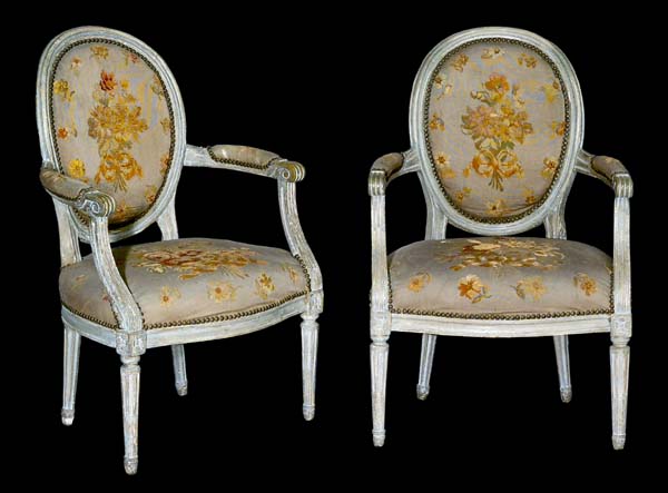 Paar Louis XVI-Armlehnstühle.